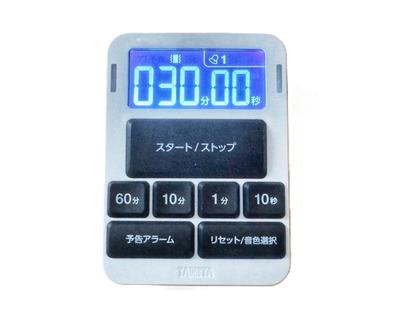 音声タイマーTD435の商品写真。しろくてたてながの本体、ボタンは黒、液晶は反転液晶です